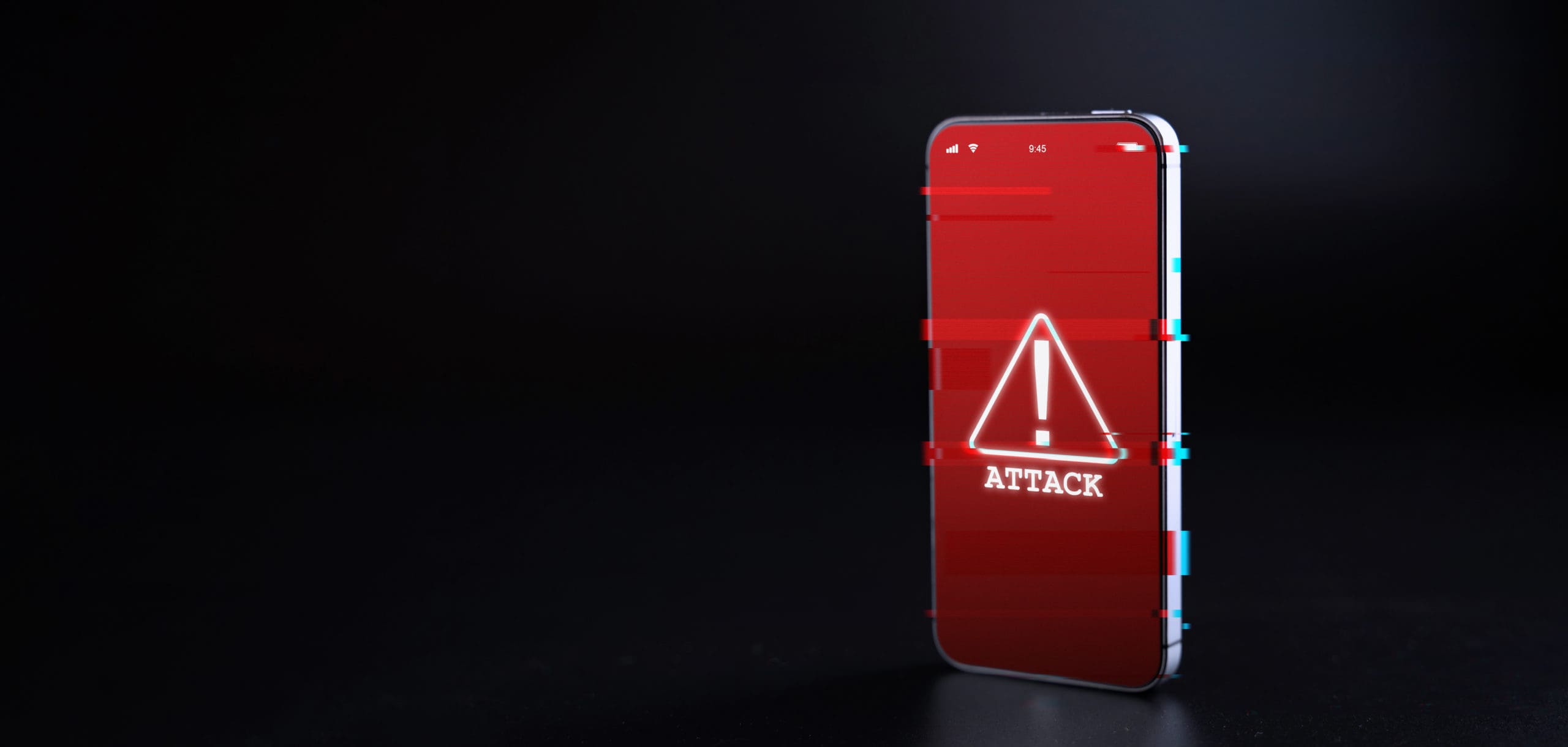 A smartphone with a red warning sign on it.