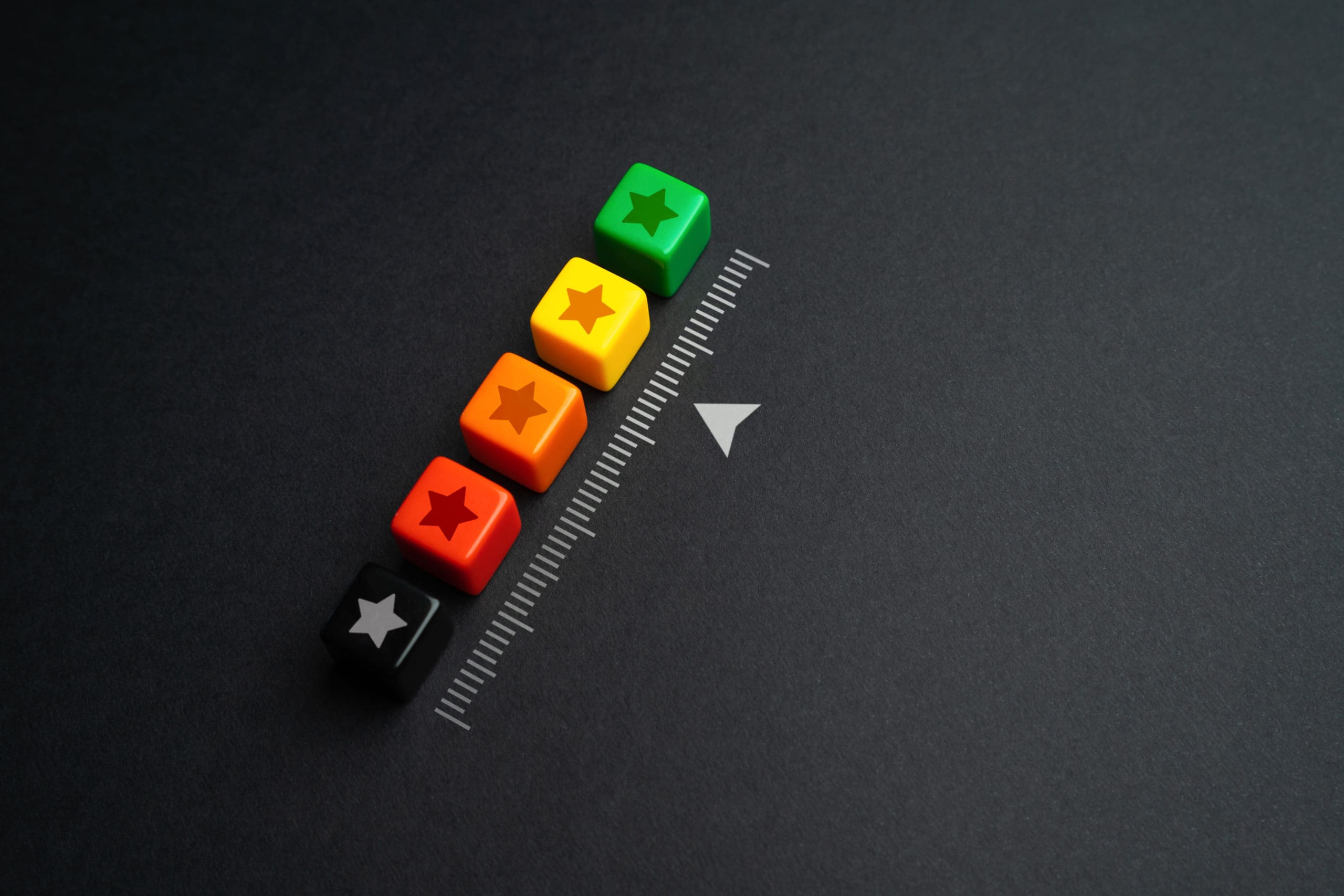 A row of colorful buttons on a black background.